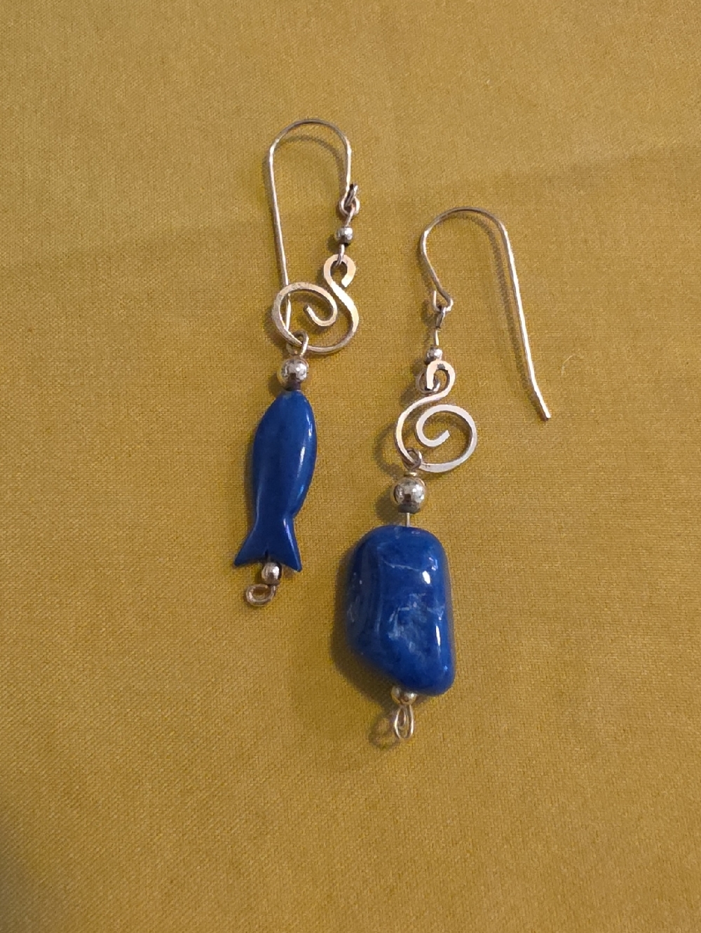 Hand-Crafted Gold-Tone Swirl Earrings with Sodalite Like Stone and Fish Charm